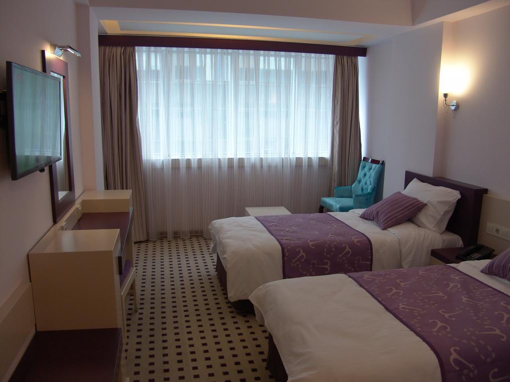 Izan Hotel Izmir Rum bild